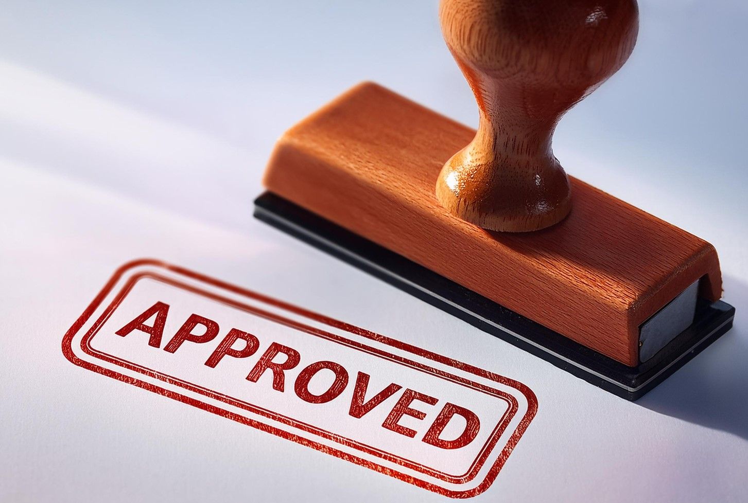 Stamp that says “APPROVED"