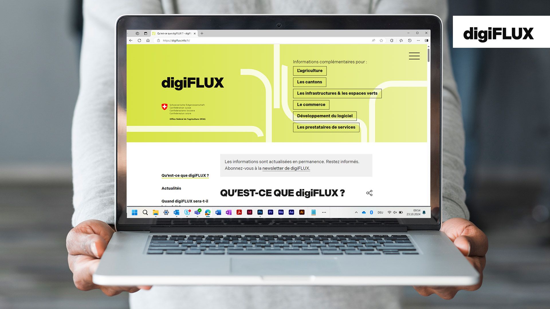 Une capture d'écran du site digiflux.info s'affiche sur un ordinateur portable.