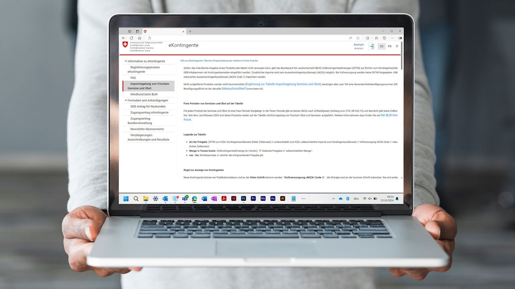 A screenshot of the eKontingente application is displayed on a laptop.