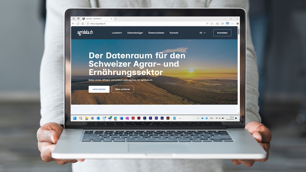 Ein Screenshot der Website agridata.ch wird auf einem Laptop angezeigt.