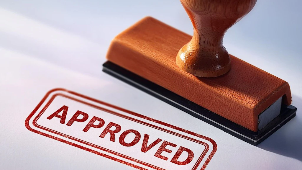 Stamp that says “APPROVED"