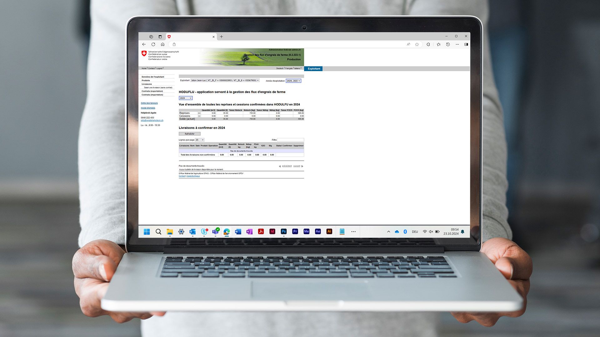 Une capture d'écran de l'application HODUFLU s'affiche sur un ordinateur portable.